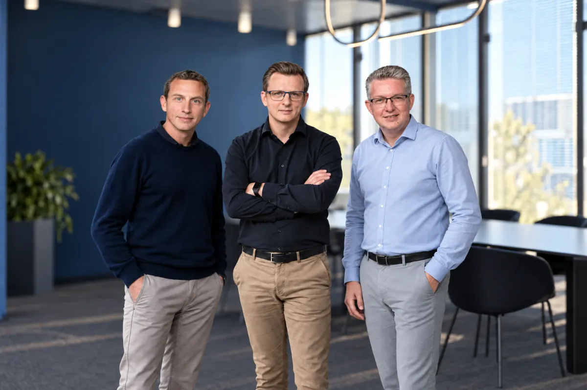 Three DNA Solutions colleagues standing together